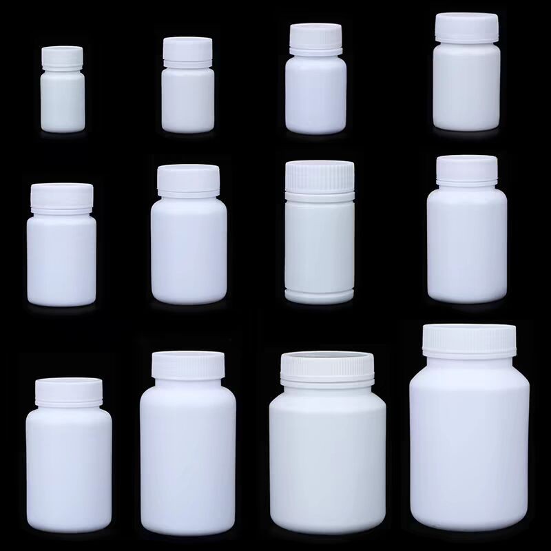 White solid bottles, 30g, 50g, 100g, pharmaceutical wide-mouth plastic bottles, powder/capsule dispensing bottles with caps.