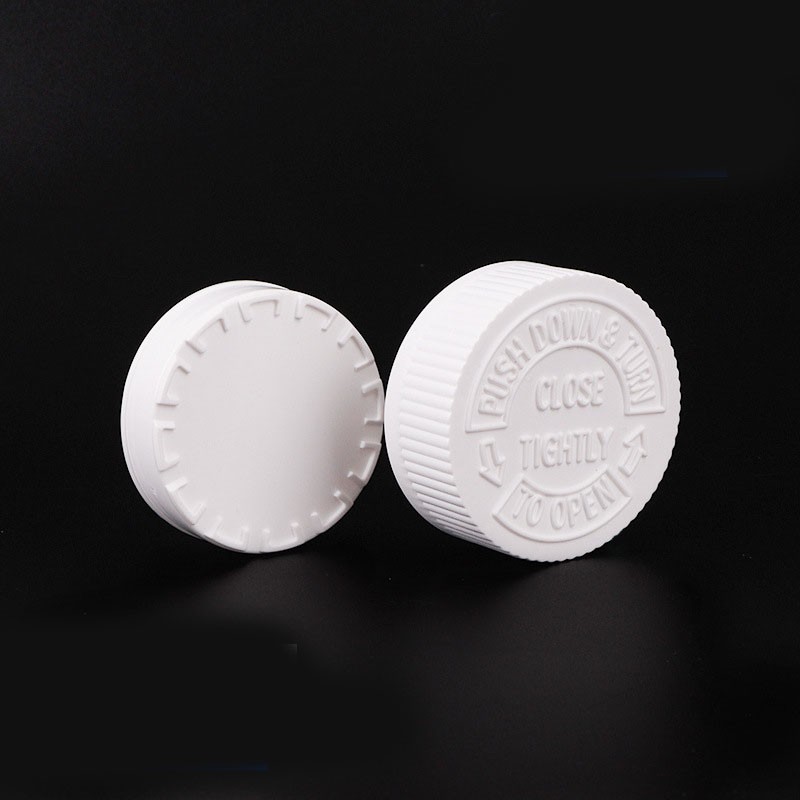 Double-layered childproof cap