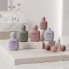 pastel-50ml-flat-pe-hand-cream-bottles-in-cosmetic-display.png