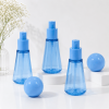 three-blue-50ml-pet-fine-mist-spray-bottles-with-spherical-caps.png