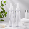 two-clear-120ml-pet-water-ripple-lotion-pump-bottles-in-bathroom.png