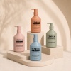 four-pastel-300ml-pe-lotion-pump-bottles-on-tiered-display.jpg