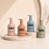 pastel-300ml-pe-lotion-pump-bottles-on-stone-podiums.jpg