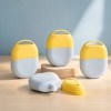 blue-and-yellow-50ml-pp-sunscreen-bottles-arranged-in-a-tabletop-display.jpg