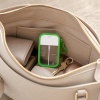 green-50ml-petg-framed-card-spray-bottle-stored-inside-a-handbag.jpg