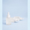 white-50ml-all-pp-dropper-bottle-and-components-arranged-on-blue-background.jpg