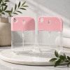 two-pink-and-clear-38ml-petg-card-spray-bottles-in-a-lifestyle-display.jpg