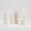 custom-color-pcr-pp-airless-lotion-bottles-in-a-soft-white-display.jpg