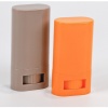 taupe-and-orange-oval-deodorant-stick-containers-with-twist-wheels.jpg