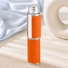 orange-pu-leather-twist-up-perfume-spray-bottle.jpeg