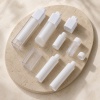 clear-rotating-airless-bottle-with-twist-up-pump.jpg