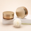 white-acrylic-cream-jar-with-flower-lifestyle-scene.jpg