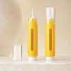 yellow-ps-airless-essence-bottle-close-up.jpg