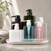 colored-square-petg-shampoo-and-lotion-bottles-on-tray.jpg