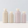 neutral-wheat-straw-hotel-amenity-bottle-collection.jpg