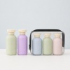pastel-wheat-straw-travel-bottles-in-clear-toiletry-bag.jpg