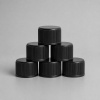 black-flat-top-plastic-bottle-cap-display.jpg