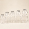 five-clear-bear-shaped-pet-bottles-without-caps.jpg