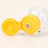 yellow-flip-top-cap-with-silicone-dispensing-valve.jpg