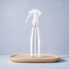 clear-pet-trigger-spray-bottle-on-wooden-tray.jpg