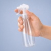 hand-holding-200ml-clear-pet-mini-trigger-bottle.jpg