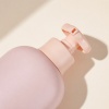 flower-shaped-lotion-pump-close-up-on-pink-bottle.jpg