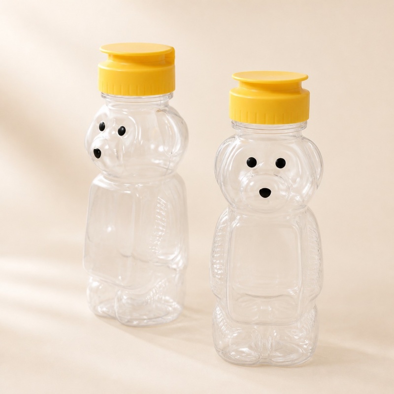 two-pet-bear-beverage-bottles-with-yellow-valve-caps.jpg