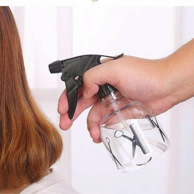 barber-using-pet-trigger-bottle-to-mist-hair.jpg