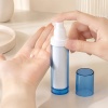 blue-as-airless-pump-bottle-dispensing-skincare-lotion.jpg