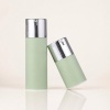 two-frosted-pp-airless-skincare-bottles-shown-at-an-angle.jpg