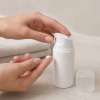 white-pp-airless-pump-bottle-dispensing-skincare-cream.jpg