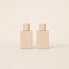 minimal-display-of-two-40ml-wheat-straw-cosmetic-bottles.jpg
