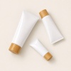 white-pe-cosmetic-squeeze-tubes-arranged-in-a-flat-lay.jpg