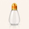 clear-pet-honey-squeeze-bottle-with-yellow-twist-open-cap.jpg