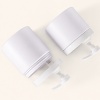 three-off-white-pet-wide-mouth-pump-jars-viewed-from-above.jpg