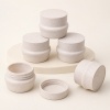 five-5ml-wheat-straw-composite-sample-jars-on-display.jpg