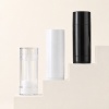clear-white-and-black-deodorant-stick-containers-on-tiered-blocks.jpg