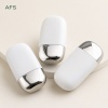 three-white-oval-cosmetic-squeeze-bottles-with-silver-base-accents.jpg