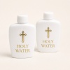 two-white-pe-holy-water-bottles-with-gold-cross-decoration.jpg