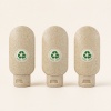 three-60ml-wheat-straw-travel-bottles-with-flip-top-caps.jpg