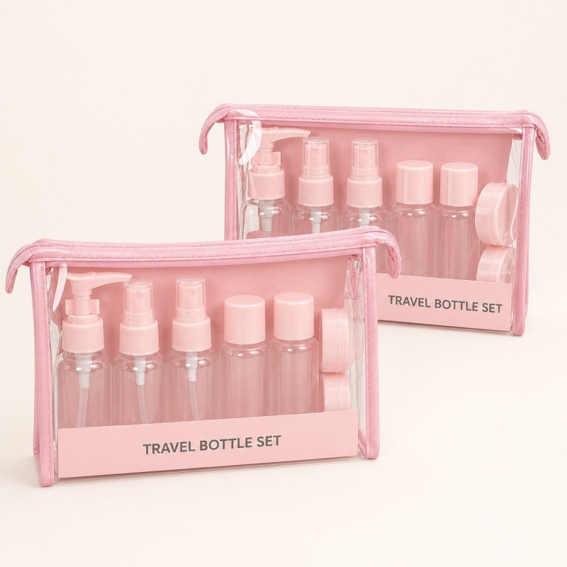 eleven-piece-pink-travel-bottle-set-packed-in-clear-pouches.jpg