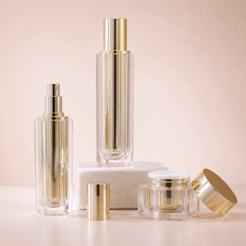 luxury-hexagonal-acrylic-pump-bottles-and-cream-jars-with-gold-finish.jpg