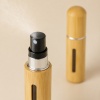5ml-8ml-bamboo-bottom-fill-perfume-spray-bottle-with-the-fine-mist-spray-actuator-in-close-up.jpg