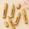5ml-10ml-bamboo-perfume-and-essential-oil-spray-bottle-arranged-in-a-neutral-flat-lay-scene.jpg