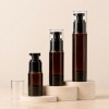 15ml-30ml-50ml-100ml-amber-pet-cosmetic-pump-bottle-four-capacity-bottle-lineup-on-a-neutral-display.jpg