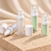 15ml-30ml-mint-refillable-airless-cosmetic-bottle-shown-as-opened-and-assembled-bottles-in-a-fixed-angle-display.jpg