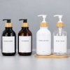 300ml-500ml-round-shoulder-pet-lotion-pump-bottle-with-bamboo-collar-shown-in-a-group-display.jpg