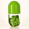 520ml-clear-pet-capsule-shaped-candy-and-supplement-jar-showing-green-capsule-filled.jpg