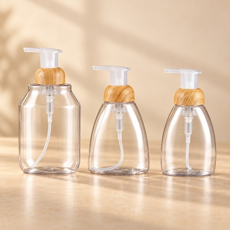 250ml-300ml-clear-pet-foaming-soap-bottle-with-woodgrain-pump-showing-three-sizes.jpg