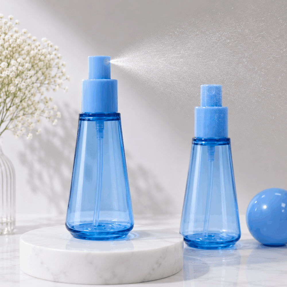two-blue-50ml-pet-spray-bottles-producing-fine-mist